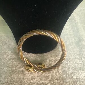 Elegant Gold and Silver Twisted Bracelet